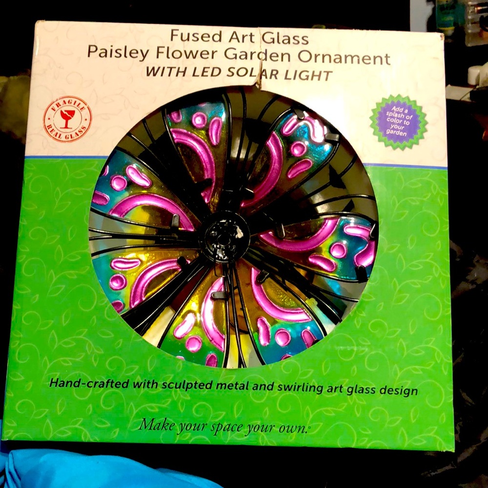 This is a floral outdoor decoration not intended to be used around children